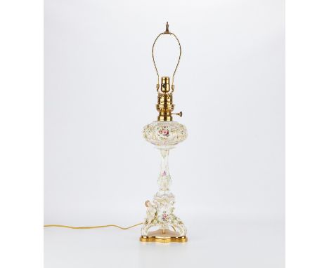 German porcelain lamp in the style of Dresden with applied floral encrustations and putti. Additional floral swags are hand p