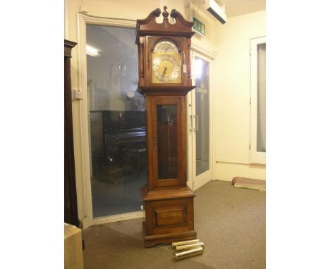 A Georgian-style longcase clock, arched brass dial with moon phase, chiming movement, fruitwood case with glazed trunk door, 