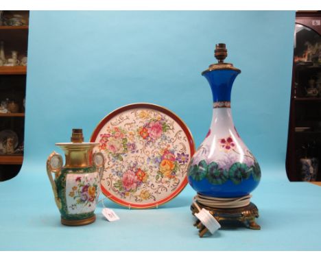 A French porcelain tray, brightly printed with flowers, 13in. together with two French porcelain vases, each converted to ele