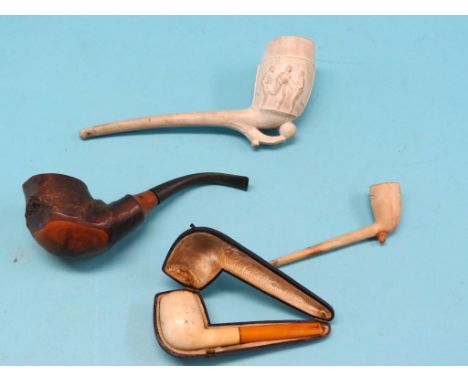 A large, late Victorian clay pipe, football-rugby, bowl relief-moulded with action scenes, registered no. 241693, circa 1895,