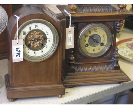 A late Victorian walnut mantel clock, architectural case with German gong-striking movement, with key and pendulum, 15.5in. a