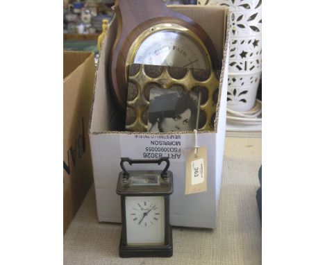An Harrod's brass carriage clock, timepiece movement with key, 6in. together with a reproduction walnut wheel barometer, mode