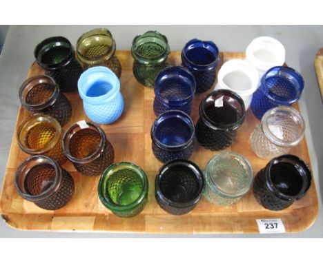 A tray of assorted moulded and coloured glass jars or possibly night light holders.(B.P. 24% incl. VAT)