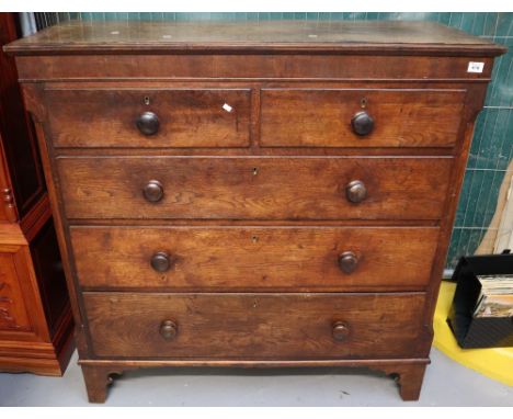 19th Century oak straight front chest of two short and three long drawers on bracket feet. (B.P. 24% incl. VAT) CONDITION REP