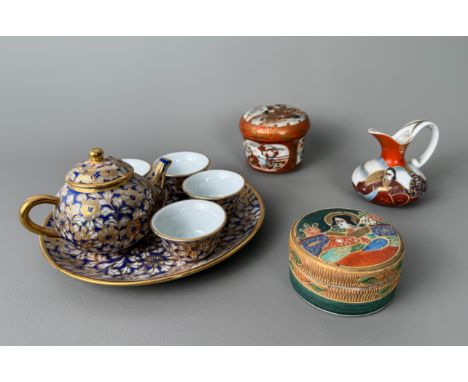 A small group of Japanese porcelain - including a drum-form Kutani covered box, signed, painted with a Samurai and smaller re