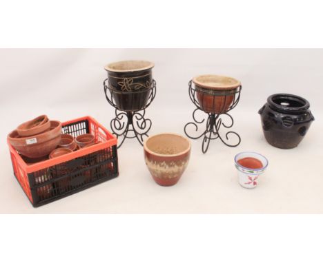Garden planters and pots comprising - a glazed strawberry planter; four glazed planters; a pair of planter stands; a good qua