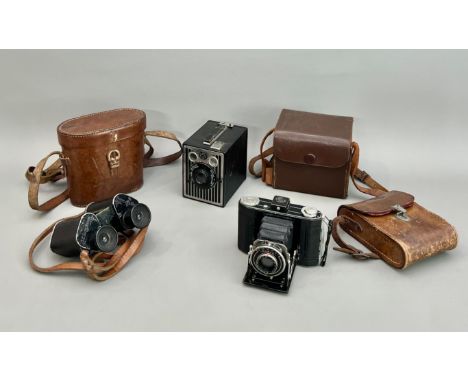 A pair of pre-war German binoculars and two vintage cameras - the lightweight aluminium 9x binoculars by C. P. Goerz of Berli