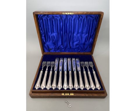 A George V oak cased silver fish knife and fork set - Maple &amp; Co, Sheffield 1911, 12 place settings, complete, the case 3