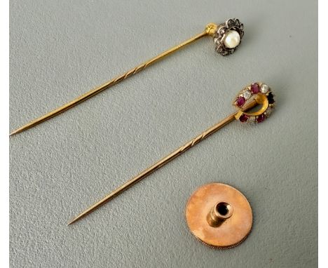 Two antique 9ct gold gem-set stick pins - unmarked (test as 9ct gold), one with a pearl and rose cut diamond daisy cluster, t