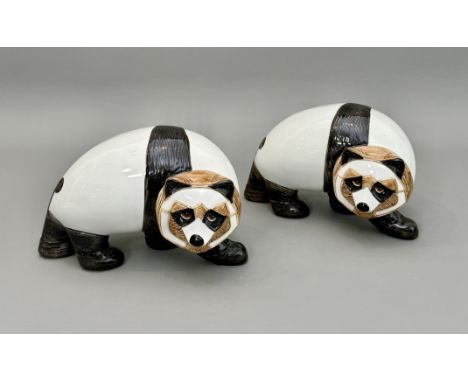 A pair of Goebel West German porcelain figures of Pandas - with printed blue factory marks dated 1986 and signature 'Selim', 