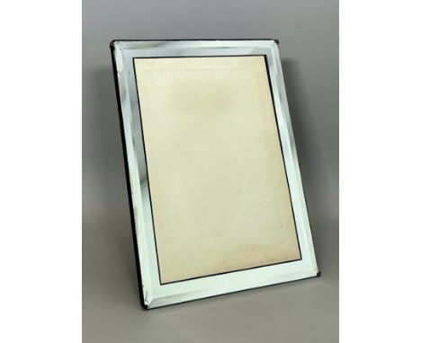 A large 1920s-30s mirrored glass photo frame - with bevelled edges and easel back, 37.75 x 27.5cm,&nbsp;