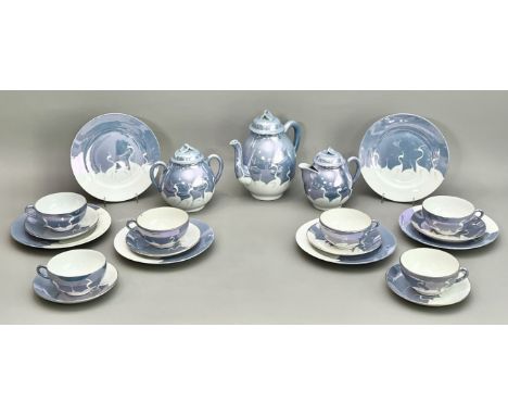 A 1920s-30s Japanese porcelain tea set in the Art Deco taste - in pale grey-blue lustre glaze with decoration of stylised whi
