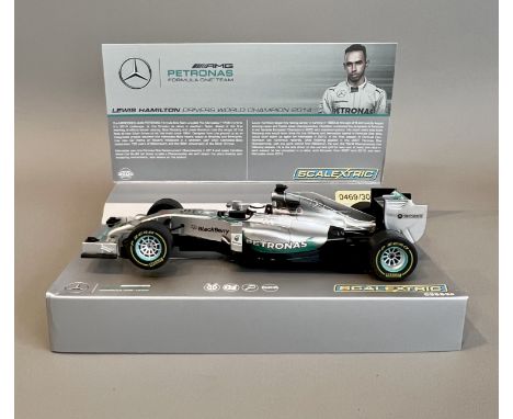 A Scalextric limited edition C3593A Mercedes F1 Lewis Hamilton 2014 World Champion slot car - no. 0469 of 3000. (Mint, box G-