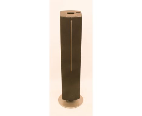 A Philips DC570 iPod Docking Entertainment System Tower - mounted on a revolving base, 102.5cm high, with instruction manual 