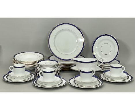 An assembled cobalt blue and gilt part dinner service - including a set of eight Royal Grafton 'Warwick' pattern soup plates,
