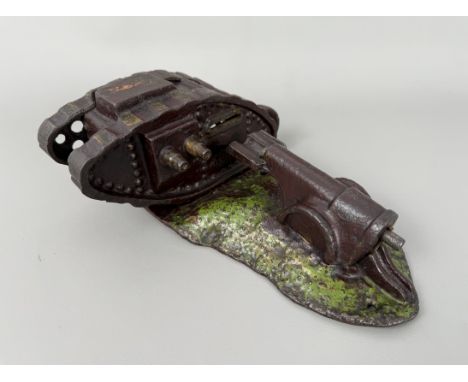A WW1 tank and cannon toy cast iron money bank - circa 1920, probably Starkies Patent, the cannon with spring-action coin lau