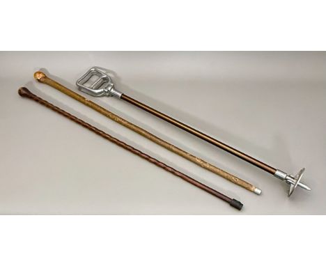 A vintage Featherwate aluminium shooting stick and two walking canes - one hazel, the other barleytwist carved hardwood.
