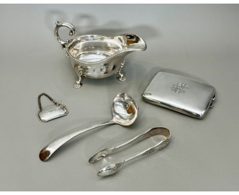 A George V silver cigarette case - Charles S Green &amp; Co, Birmingham 1918, of convex rectangular form, gilt washed interio