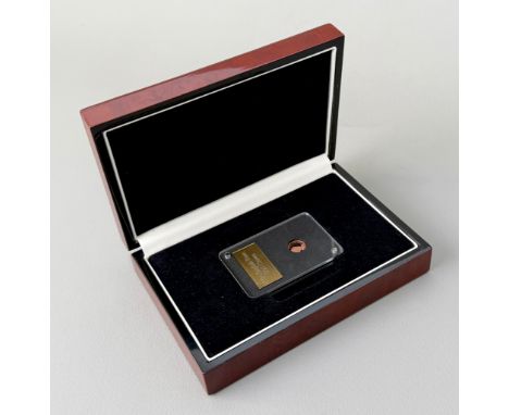 A 24ct rose gold 'English Rose' Gibraltar coin - issued to commemorate the 60th anniversary of the birth of Diana Princess of