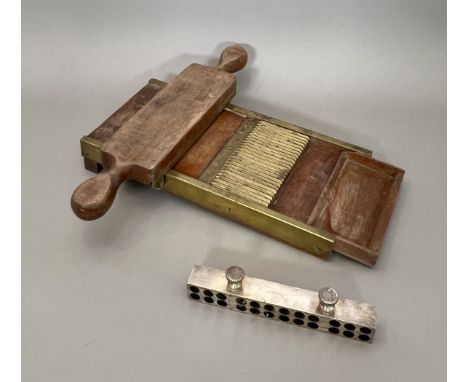 A late 19th / early 20th century pharmacist's mahogany and brass pill-rolling machine - stamped '49' to one end and one handl
