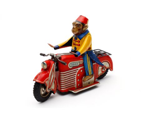 Gama Motorrad mit Affe, Nr. 125, Uhrwerk intakt, Alterungs- und Gebrauchsspuren, tw gealterter Lack, 1 kleines Loch im Filz, 