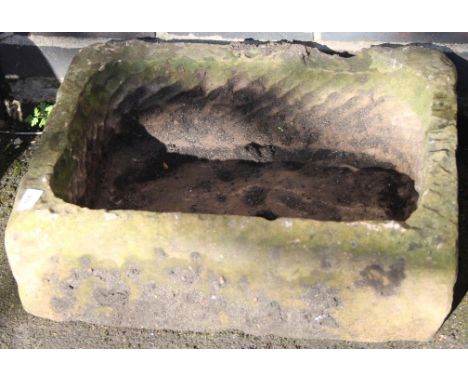A rectangular stone trough, 19cm high, 43cm wide, 54cm deep.