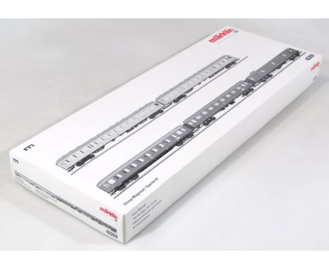 A Marklin HO-gauge train set 42269, with certificate, comprising of Eilzug-wagensct/epoche II carriages. (boxed)