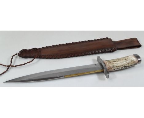 An Old West style tooth pick hunting knife, with horn handle, chrome plate guard and compressed pommel with bi-coloured blade