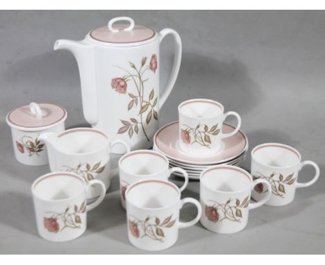 A Susie Cooper bone china part coffee service, to include coffee pot, 22cm high, cups, saucers, etc, decorated with roses. (a