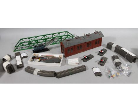 Various Marklin HO-gauge buildings, etc., to include engine shed, 9cm high, rotating crane, various other unboxed rolling sto