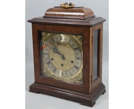 A 20thC Thwaites and Reed Ltd AA Bond & Son retailed walnut finish caddy topped bracket clock, the shaped case containing a b