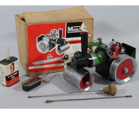 A Mamod SR1 steam roller, with articulated front, predominately in green, black, red and chrome colourway, 22cm wide. (boxed)