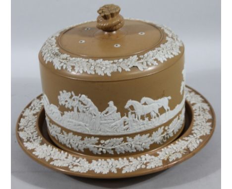 A mid 19thC brown and white stoneware cheese bell on stand, in the manner of The Dudson Brothers, with wheat sheaf knop, repe