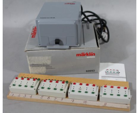 A Marklin Systems boxed transformer, 60VA, no. 60052, 15cm high and other electrics 72710. (boxed)