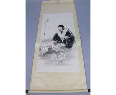 Early 20thC Chinese School. Kneeling figure feeding doves, watercolour, signed, scroll on textured material with wooden end, 