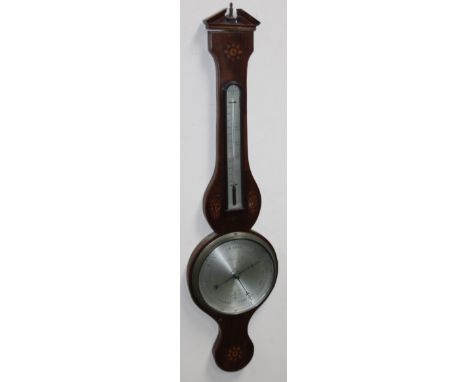 A 19thC mahogany and inlaid two dial banjo barometer, with silvered 23cm main dial surmounted by a thermometer in a broken pe