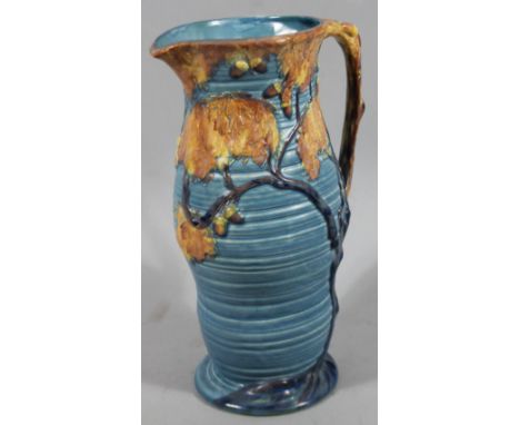 A Carltonware 794854 1098/3 jug, with moulded spout and handle, ribbed bellied circular body raised with on and a circular fo