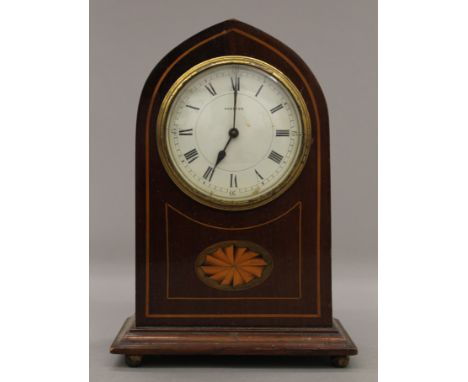 An Edwardian inlaid mahogany mantle clock. 22 cm high.