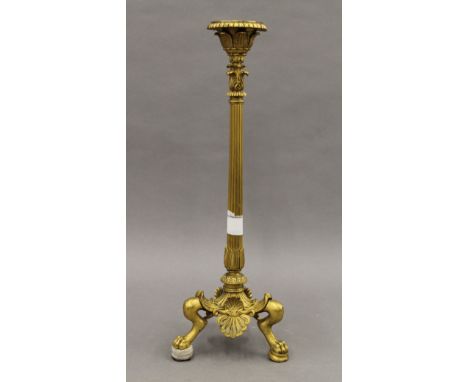 A 19th century ormolu candlestick. 35.5 cm high.