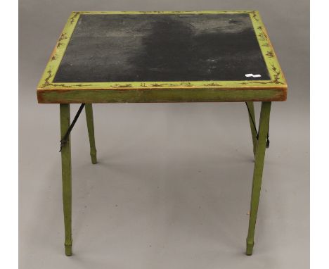 An early 20th century chinoiserie decorated folding card table. 76 cm square.