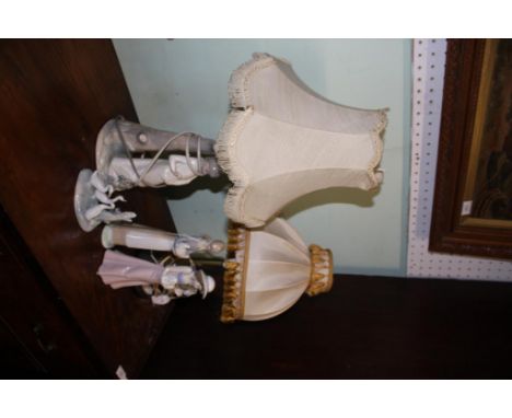 including a Lladro style table lamp together with a collection of NAO figures and another lamp (5)