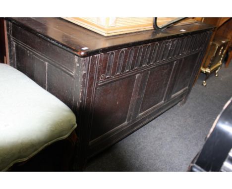 the large trunk opening to reveal an unfitted interior raised on short legs