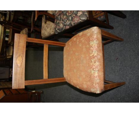 the straight backs inlaid with shell vignettes on a tapestry seats raised on straight cut legs