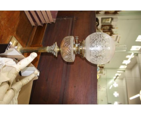 the glass lamp and shade held on a brass Corinthian column support