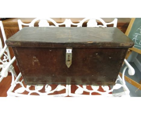 An 18th century leather carriage trunk with metal fittings and fabric lining