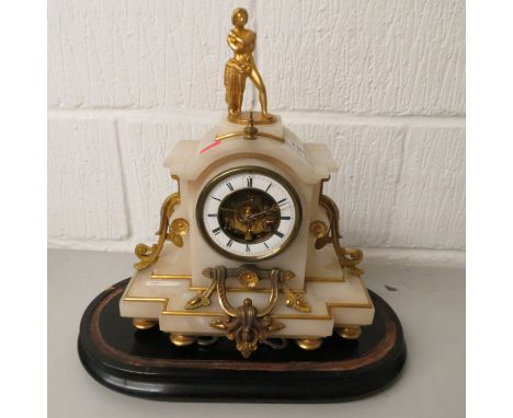 A 19th century French white onyx mantle clock with gilt mounts, enamel dial, showing balance with stand and dome