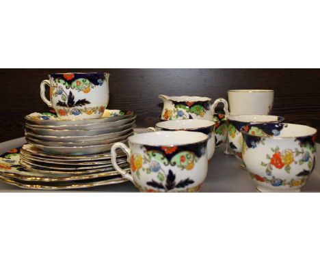 BOGNOR ROYAL ALBERT FLORAL PATTERN TEA SET
in primary colour and gilt, five cuops, saucers, side plates and two cake trays; t