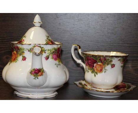 ROYAL ALBERT 'OLD COUNTRY ROSES' TEA WARE
including a tea pot, sugar, cream, three cups, saucers and side plates plus a pin d