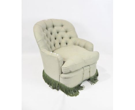 A pale green upholstered button back armchair with dark green braided trim, height 77cm