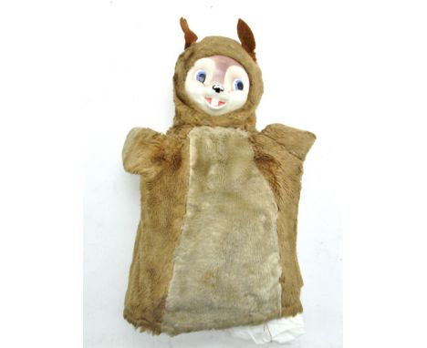 A vintage child's glove puppet, designed in the form of a rabbit